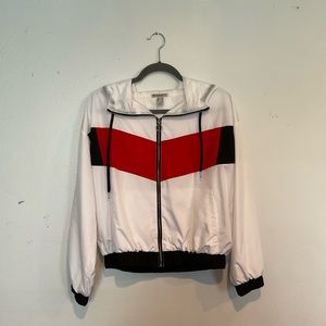 White windbreaker with red stripe across